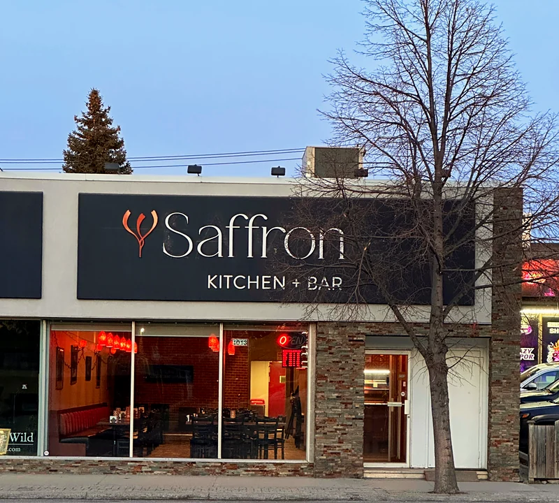 The Saffron Kitchen + Bar storefront on Broadway Avenue